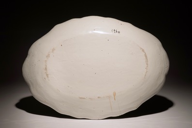 A large oval monochrome white platter, France, 18th C.